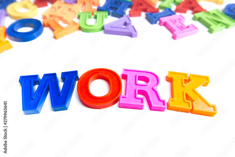 Heap of plastic colored alphabet letters close up. Work Heap of plastic colored alphabet letters close up. Work