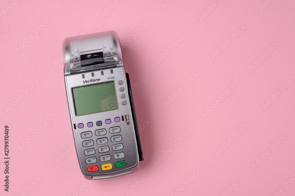 POS terminal on pink background POS terminal on pink background