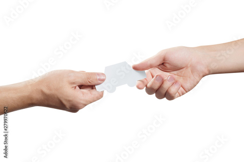 Hands sharing a small white car, isolated on white background