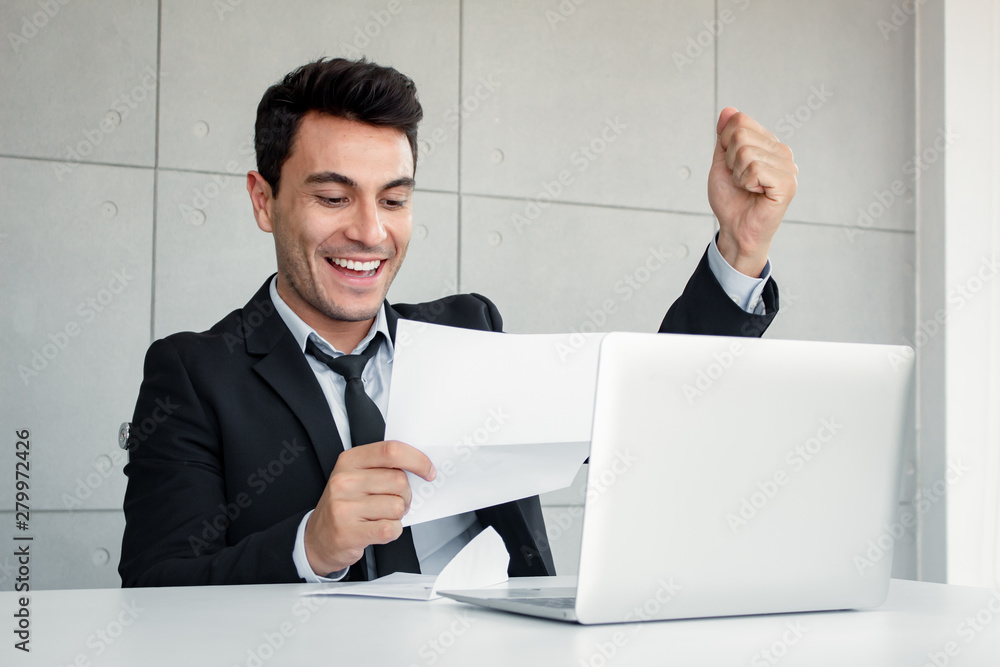 Businessman opened the envelope with symptoms of ecstasy. Businessman opened the envelope with symptoms of ecstasy.