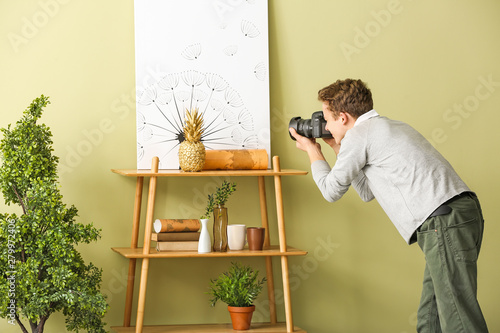 Teenage boy with photo came...