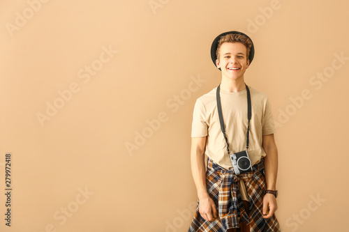 Teenage boy with photo came...