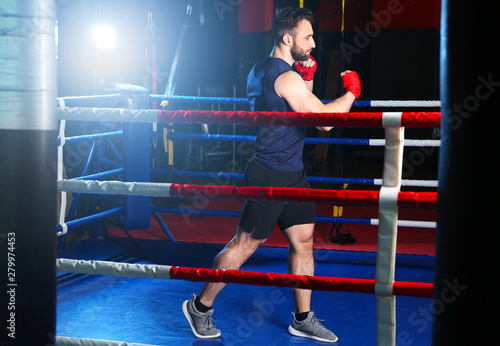 Sporty man in boxing ring