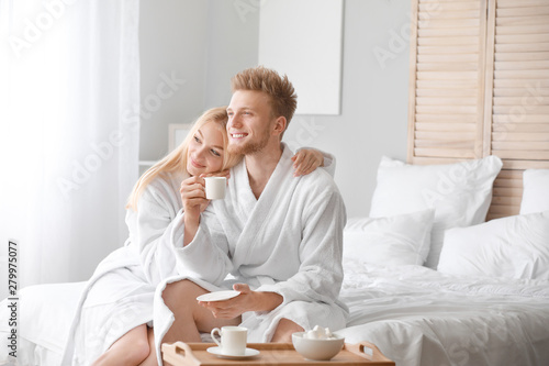 Morning of happy young coup...