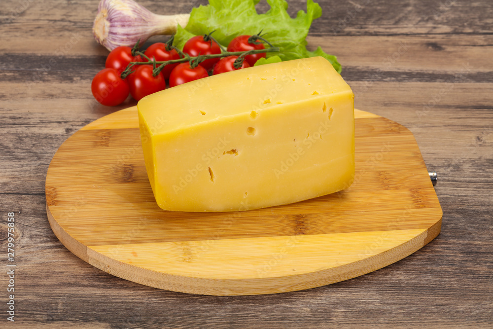 Hard yellow tasty cheese brick Hard yellow tasty cheese brick