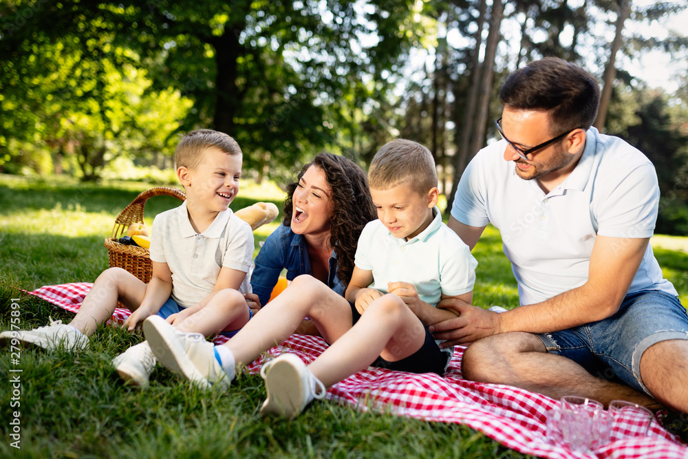 Young family with children having fun in nature