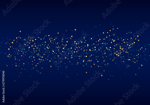 Abstract falling golden glitter lights texture on a dark blue background with lighting. Magic gold dust and glare. Festive Christmas background.