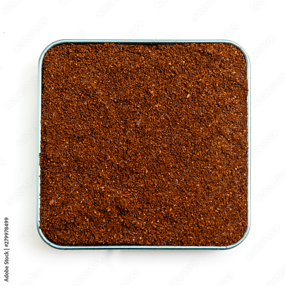 Ground coffee on a white background - top view Ground coffee on a white background - top view