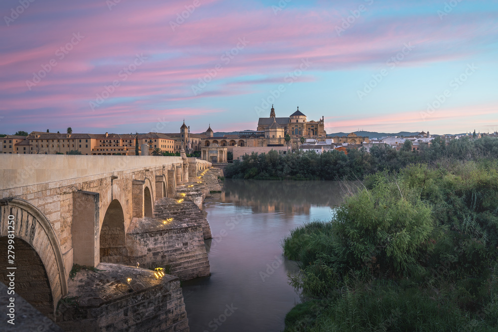 Cordoba skyline at sunrise with Old Roman Bridge and Mosque Cathedral - Cordoba, Andalusia, Spain
