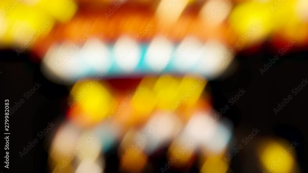 Defocused image of a carousel against a dark background. Defocused image of a carousel against a dark background.