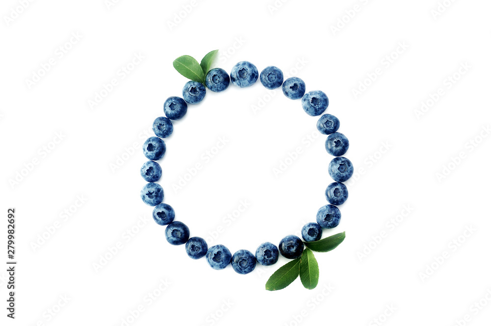 Summer blueberry round frame isolated on white background. Berries border design. Close up top view or flat lay with place for your text Summer blueberry round frame isolated on white background. Berries border design. Close up top view or flat lay with place for your text