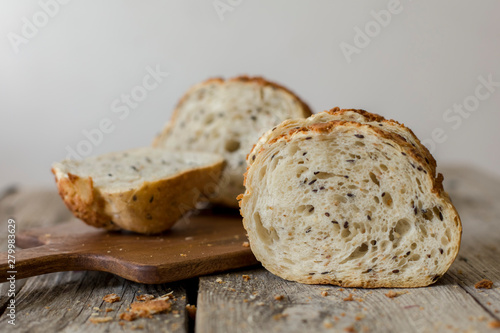 sliced sourdough bread loaf on the wooden table