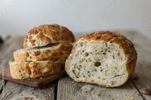 sliced sourdough bread loaf on the wooden table