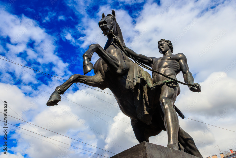The Horse Tamers sculpture on Anichkov bridge in St. Petersburg, Russia