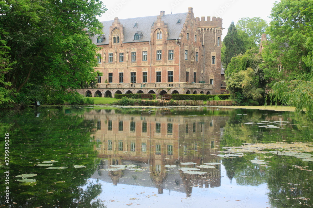 Beautiful moated castle in a park