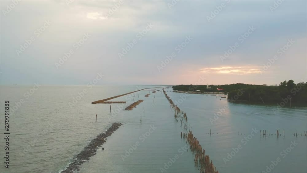 Bamboo and cement Used as a dam Protect the sea Coast erosion. Bamboo and cement Used as a dam Protect the sea Coast erosion.