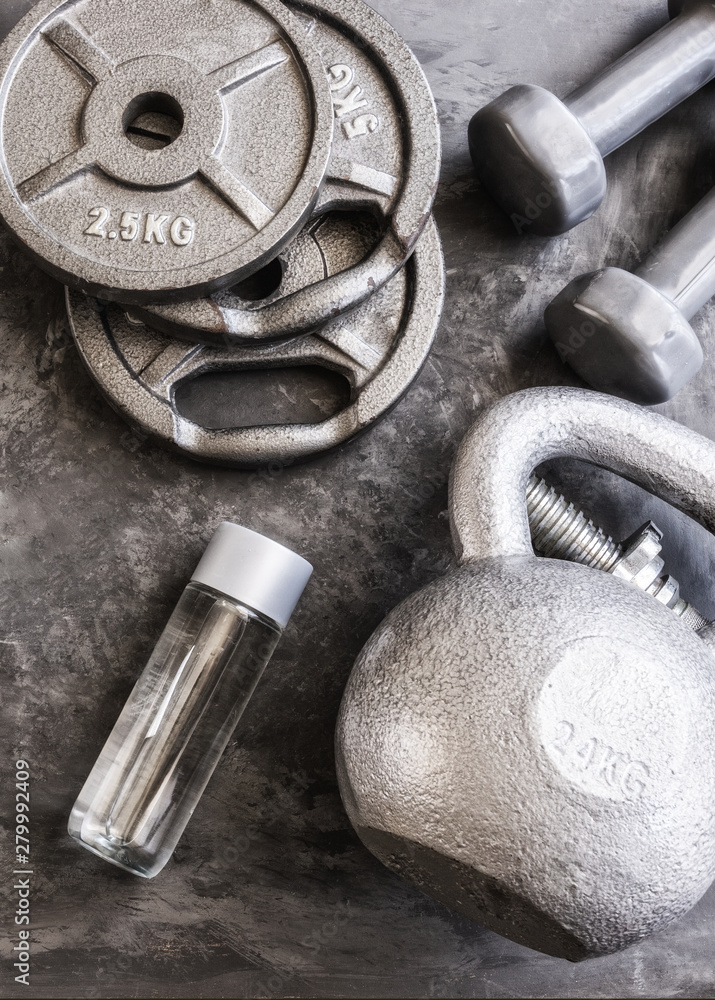 Weight plates for barbell grey dumbbells kettlebell and water
