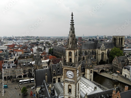 Amazing view from above. Small and comfortable town Gent. Medieval history around you.Must see for all explorer. View from Drone. From Belgium with Love. Clock tower. © Oleksandr