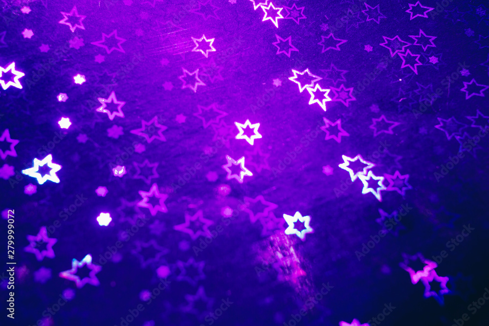 Gold abstract blurred background of glitter golographic stars. Gold abstract blurred background of glitter golographic stars.