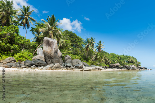Seychelles coastline with big rocks and greens