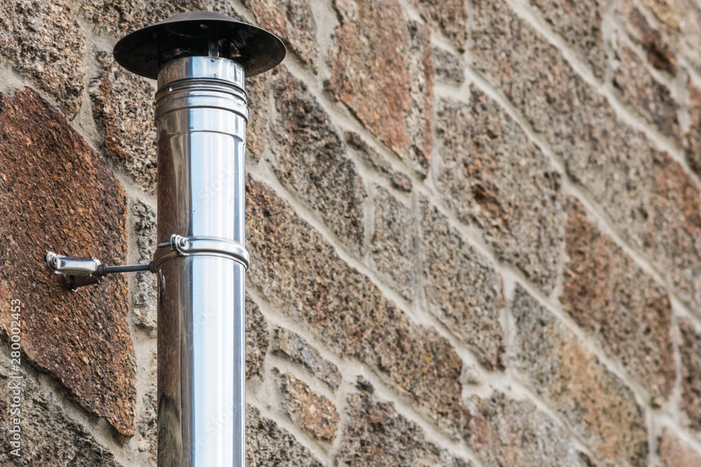 stainless chimney in stone wall stainless chimney in stone wall