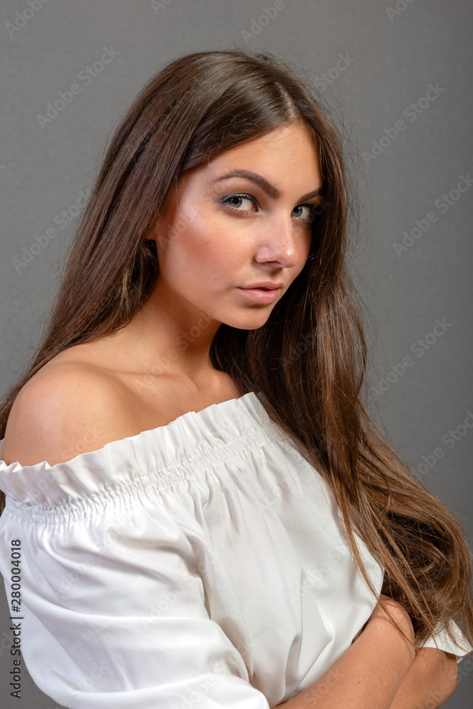 Emotional young woman portrait on dark background - image Emotional young woman portrait on dark background - image
