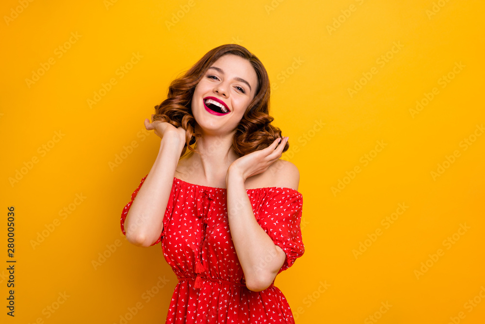 Foxy lady touch curly hairstyle overjoyed by new appearance wear off-shoulders dress isolated yellow background Foxy lady touch curly hairstyle overjoyed by new appearance wear off-shoulders dress isolated yellow background