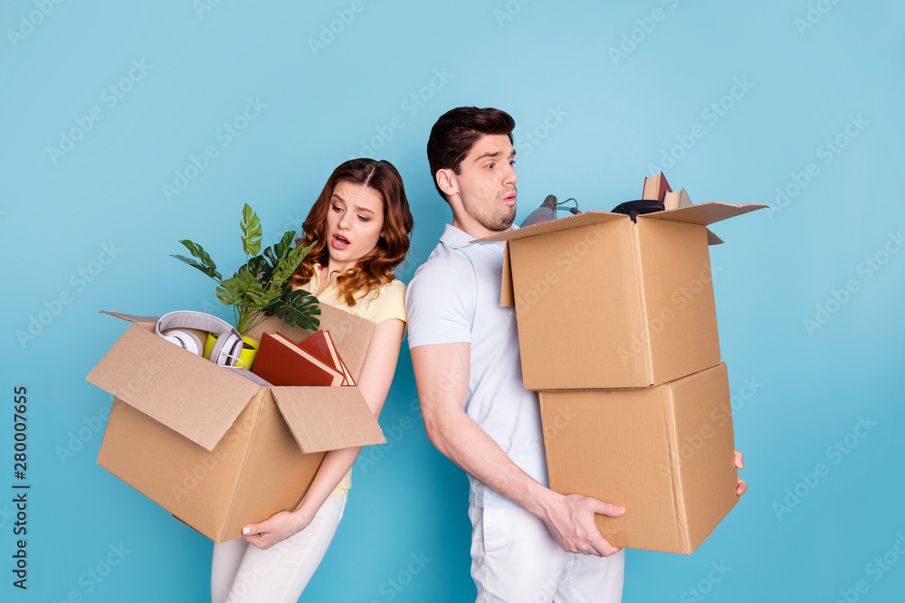 Portrait of his he her she nice-looking attractive sad unhappy upset worried nervous people carrying big large boxes packages isolated over bright vivid shine blue green background - obrazy, fototapety, plakaty 