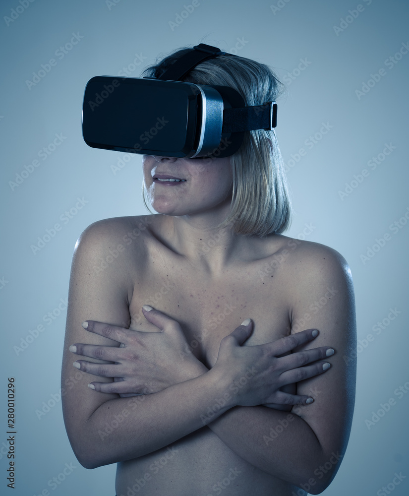 Portrait of sexy half-naked young woman wearing Virtual Reality headset  exploring 3D sexuality foto de Stock | Adobe Stock