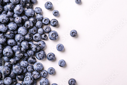 Perfectly ripe freshly picked local produce blueberries. Close up, copy space for text, top view, background. Healthy vegan snacks full of antioxidants. Seasonal summer berries.