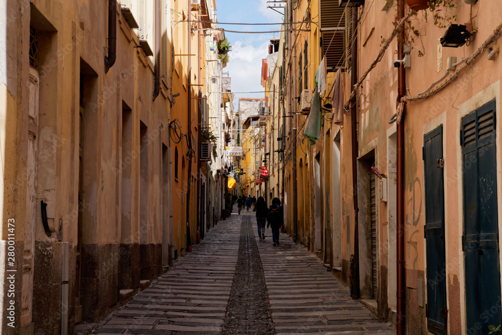 Typical pedestrian street between two row of houses in Cagliari (Sardinia) Italy