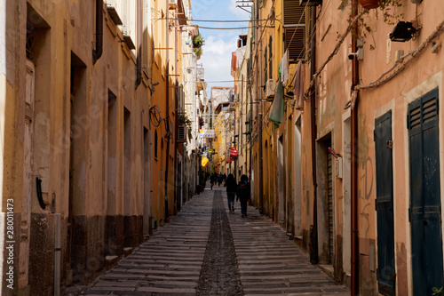 Typical pedestrian street between two row of houses in Cagliari (Sardinia) Italy