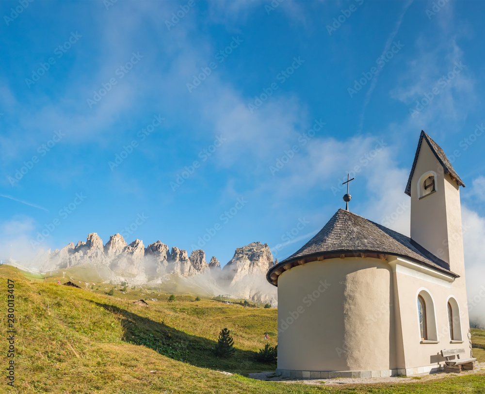 Chapel with mountain view in background, Passo Gardena, Dolomite Mountains, Italy