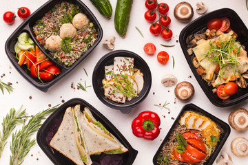Good quality food in take away boxes with fresh vegetables
