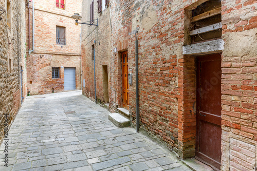 Doors in an old alley with paving stones