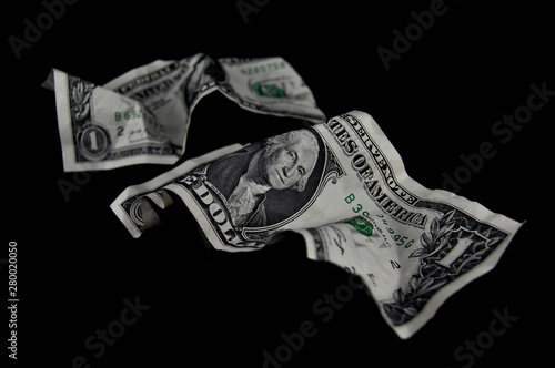 Dollar on black background close-up. Money, business, currency, crisis, default