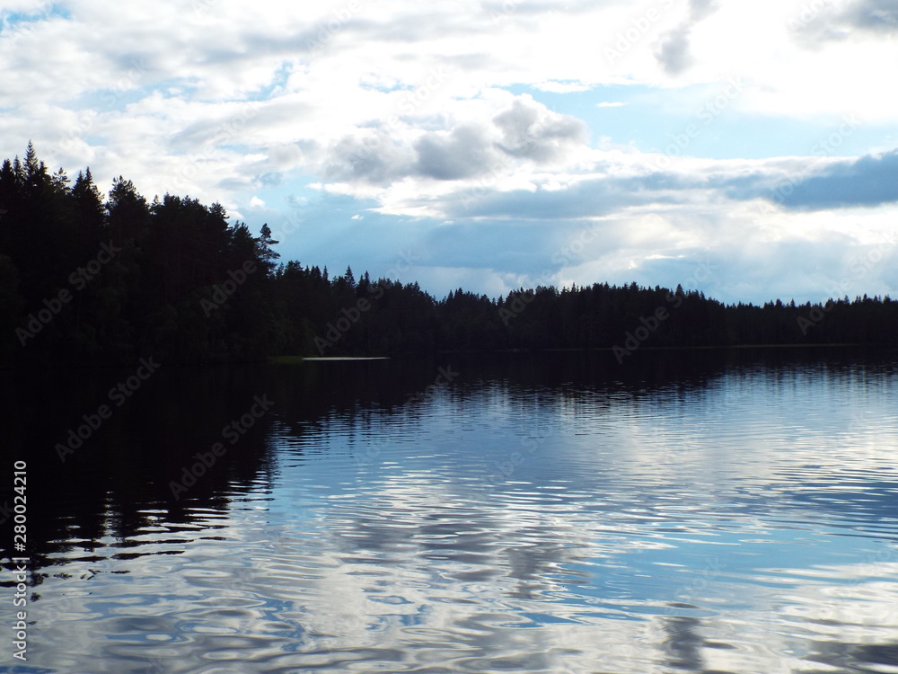 clouds in the sky over the lake