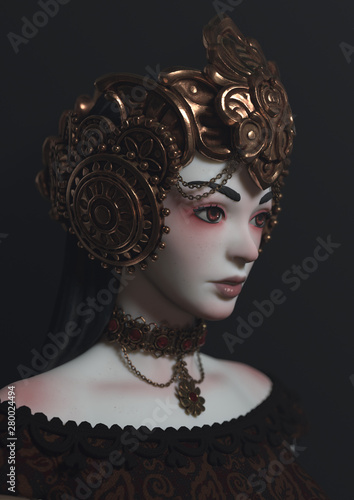 3d illustration of pale-faced girl in fantasy bronze helmet on dark background. Close-up portrait of medieval queen in decorative golden crown with oriental ornaments. Beautiful girl with ornate crown