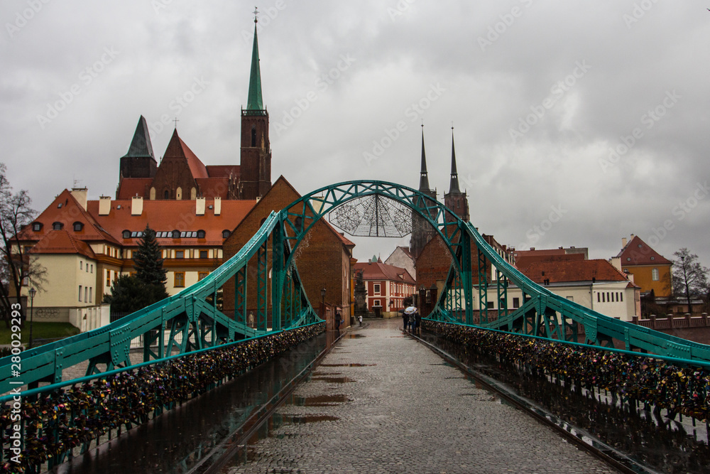 View of Tumski Bridge and ancient churches in Wroclaw. Poland