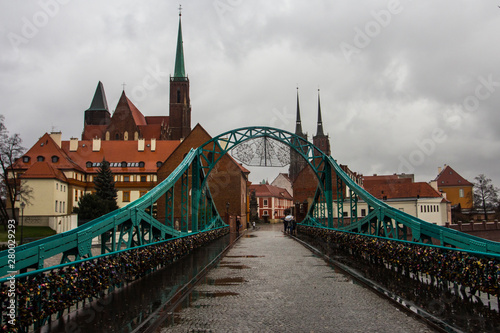 View of Tumski Bridge and ancient churches in Wroclaw. Poland