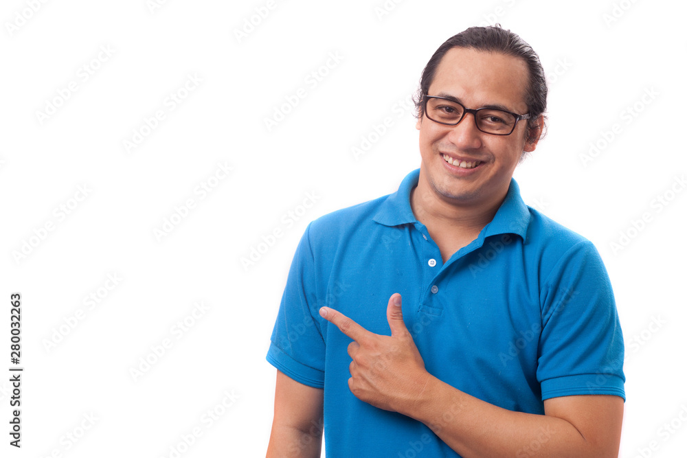 Young Man Showing and Pointing Something on His Side Young Man Showing and Pointing Something on His Side