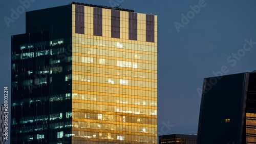 Time lapse of city life people do business in office high building from day to night time , lifestyle of urban nowaday., Lockdown.