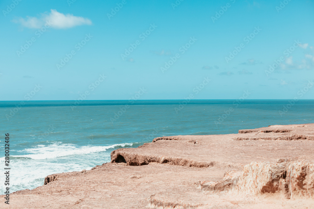 paradise beach without people with hills and palm trees paradise beach without people with hills and palm trees
