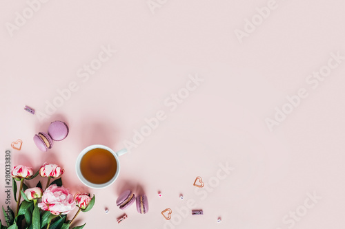 Greeting card with peonies and macaroons.