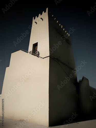 View of Barzan Towers(Umm Salal Mohammed Towers) were constructed in late 19th century and rebuilt in 1910 by Sheikh Mohammed bin Jassim Al Thani in Doha, Qatar  photo