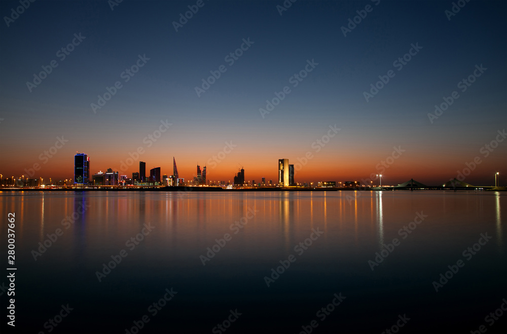 Naklejka premium Bahrain skyline during evening hours at sunset