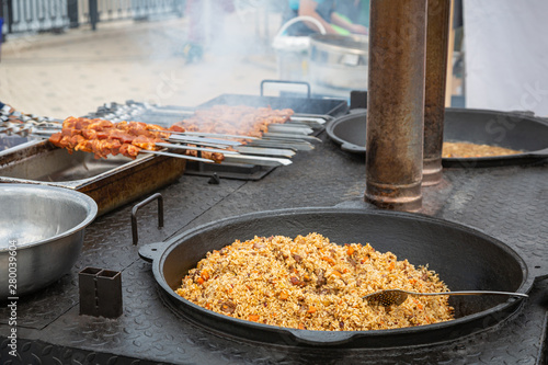 The preparation of pilaf and kebab on the street.