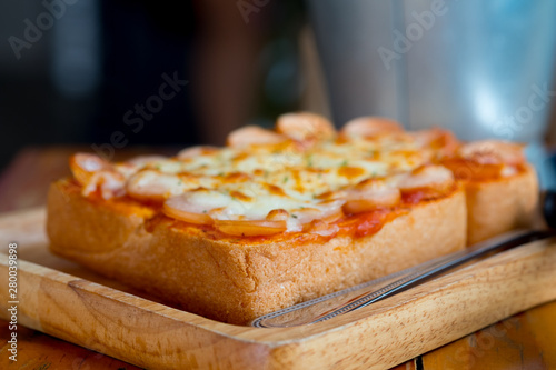 Pizza toasted bread and hotdog cheese.