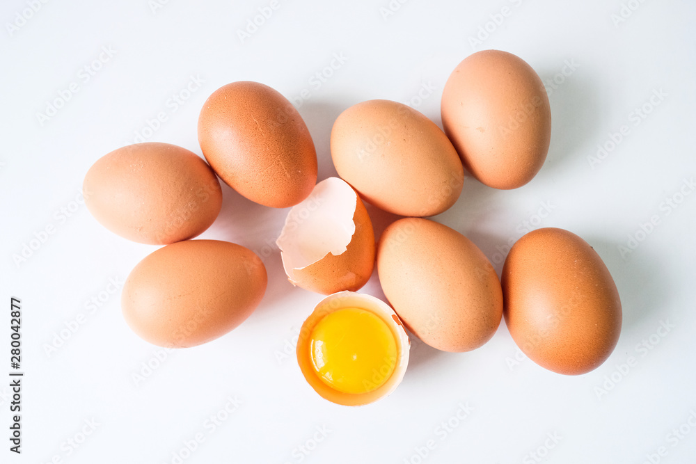 Fresh eggs from the farm placed on a white wooden table background Fresh eggs from the farm placed on a white wooden table background