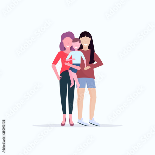 Two young mothers lesbians holding little daughter